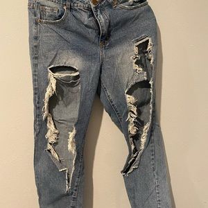 High waisted 90s ripped blue jeans